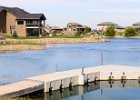 8  A simple L in a community of new homes.  Wooden dock used as a ramp.